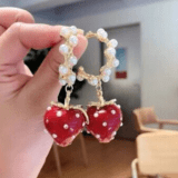 big strawberry pearl earrings