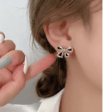 Black bow stud earrings