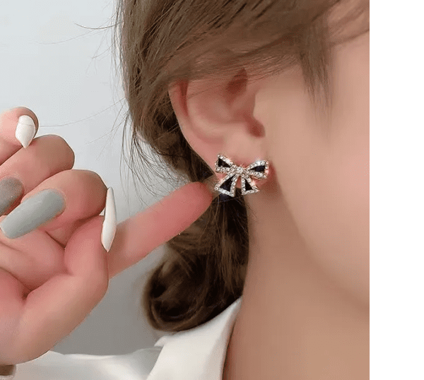 Black bow stud earrings